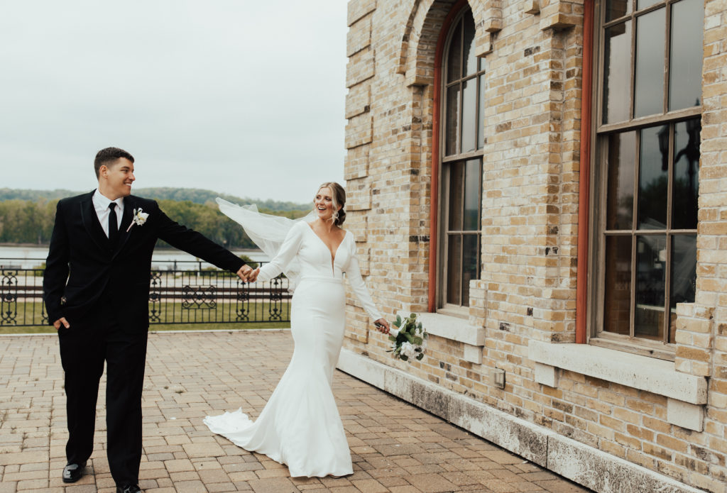 Elegant bride and groom portraits at their venue at the Dousman House in Prairie du Chien, WI.