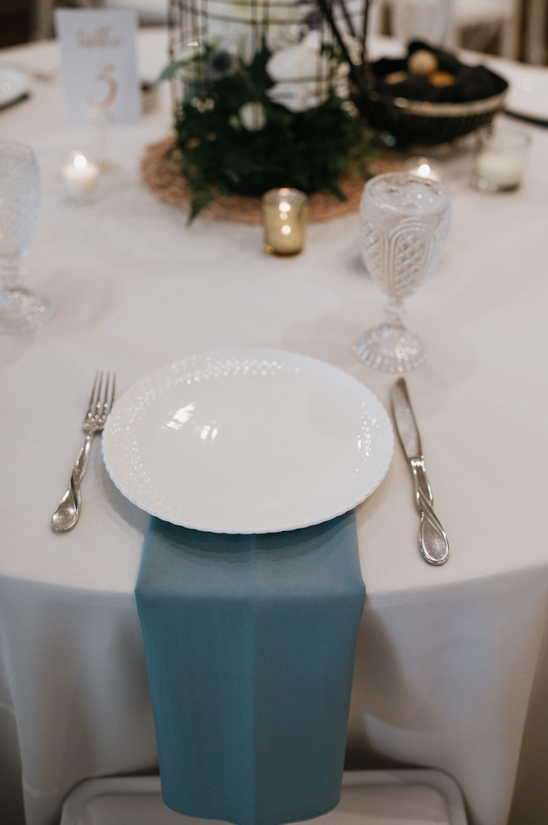 Simple teal wedding table place setting. 