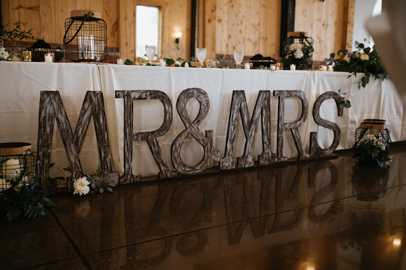 Giant wooden Mr. and Mrs. sign. 
