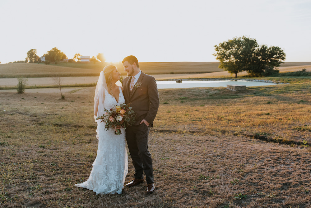 Bride and groom sunset portraits in Iowa captured by Aubree Taylor photography.